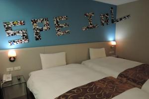 ภาพในคลังภาพของ Travel Art Inn ในนครเจียอี้