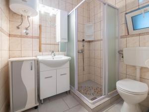 Ванна кімната в Apartments Anamarija