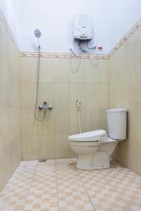 Phòng tắm tại OYO 801 Hansa Homestay