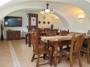 A restaurant or other place to eat at Holiday Home Sezímky by Interhome