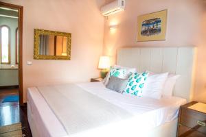 Posteľ alebo postele v izbe v ubytovaní Summerday Villa Private Beach