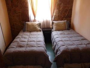 Letto o letti in una camera di Hostal Desert
