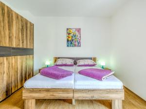 Postel nebo postele na pokoji v ubytování Apartment Ulika-1 by Interhome