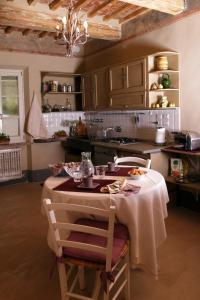 Kuchyň nebo kuchyňský kout v ubytování Casa Soleluna B&B