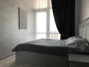 Ліжко або ліжка в номері Грибовка Апартаменты 137 - Black Sea Bugaz
