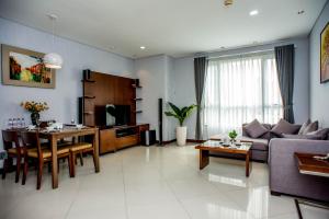 Khu vực ghế ngồi tại The Lancaster Saigon Service Apartment