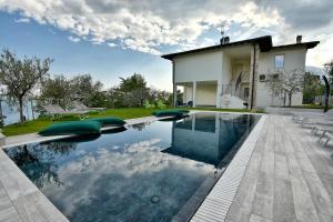 Bazén v ubytovaní Verdeulivo Relax Home - Ruculì Hospitality alebo v jeho blízkosti