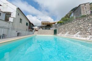 The swimming pool at or close to Lo Smeraldo Private Pool Villa Ravello by ElodeaGroup