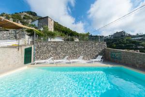 The swimming pool at or close to Lo Smeraldo Private Pool Villa Ravello by ElodeaGroup
