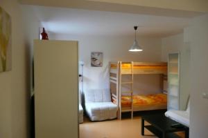 เตียงในห้องที่ Apartmán Dalibor II č. 305