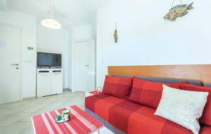 Televízia a/alebo spoločenská miestnosť v ubytovaní Apartmani Lisičak A2+2