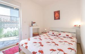 Posteľ alebo postele v izbe v ubytovaní Apartmani Lisičak A2+2