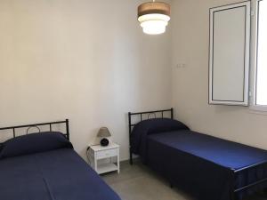 A bed or beds in a room at Casa Vigna da Michela