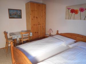 Ein Bett oder Betten in einem Zimmer der Unterkunft Haus Amalia