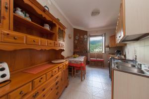 A kitchen or kitchenette at Lo Smeraldo Private Pool Villa Ravello by ElodeaGroup