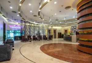 Posezení v ubytování Radisson Gurugram Sohna Road City Center + 37 fotografií