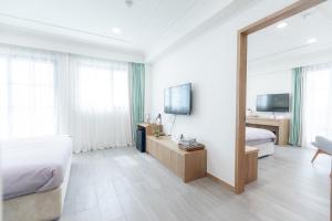 Kiwi Villa TV 또는 엔터테인먼트 센터