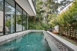 Bazén v ubytování Woodpecker Villa - Kamala Beach nebo v jeho okolí