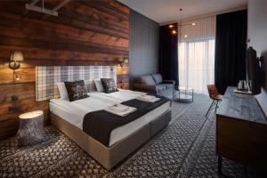 Łóżko lub łóżka w pokoju w obiekcie Salio Equisport Resort