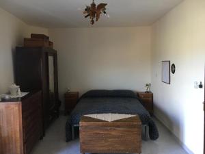 Voodi või voodid majutusasutuse Casa Vacanze " MELA " toas