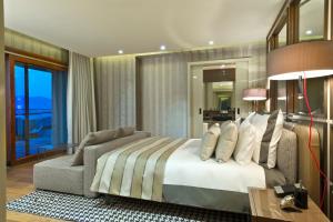 Кровать или кровати в номере D Maris Bay