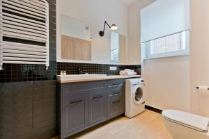 A kitchen or kitchenette at Imperial Apartments Helska