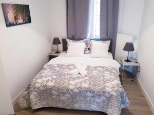 Кровать или кровати в номере Brussels appartments luxury