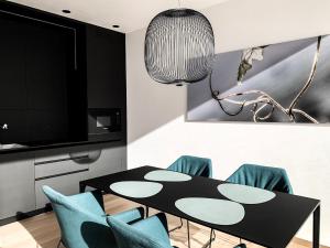 TV a/nebo společenská místnost v ubytování Pratenberg Wine Lodge