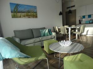 Posedenie v ubytovaní Apartament z widokiem na morze - Apartament Turkusowy