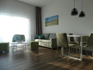 Posedenie v ubytovaní Apartament z widokiem na morze - Apartament Turkusowy