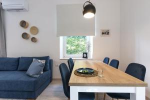 Posedenie v ubytovaní *** Lounge terrace apartment with the harbour view / city centre ***