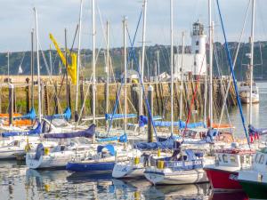 a group of boats docked in a harbor at 18 Howard Street in Scarborough