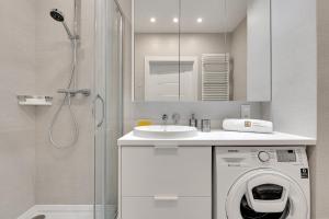 Kúpeľňa v ubytovaní Luxury Voyage Apartments + extra bikes + 25 fotografií