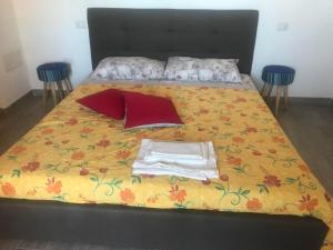 Ein Bett oder Betten in einem Zimmer der Unterkunft Casa Alessandro