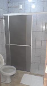 Um banheiro em Hotel Maringa