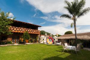 Κήπος έξω από το Paradise Hotel Boutique & Lounge