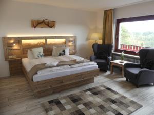 Postel nebo postele na pokoji v ubytování Harmonie Hotel Rust