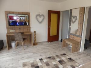 TV a/nebo společenská místnost v ubytování Harmonie Hotel Rust