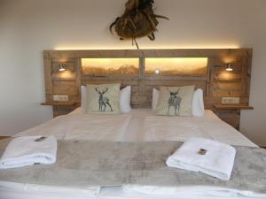 Postel nebo postele na pokoji v ubytování Harmonie Hotel Rust