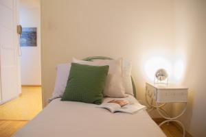 A bed or beds in a room at Casa Brunetta - WelcHome