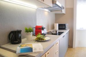 A kitchen or kitchenette at Casa Brunetta - WelcHome