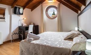Postel nebo postele na pokoji v ubytování Antico Borgo Chieti
