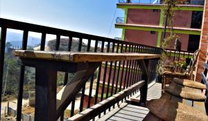 Balkon atau teras di Berg House Cafe and Hotel