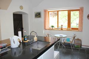 Η κουζίνα ή μικρή κουζίνα στο Statek-Hofje