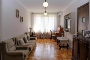 TV a/nebo společenská místnost v ubytování Prometheus Apartment