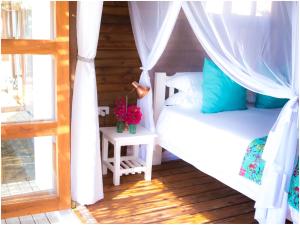 Postel nebo postele na pokoji v ubytování Paradise Dunes