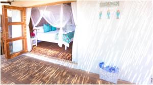 Postel nebo postele na pokoji v ubytování Paradise Dunes