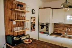A kitchen or kitchenette at Apartmán II Terchová