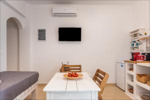 TV i/ili multimedijalni sistem u objektu Krystalia's Apartment