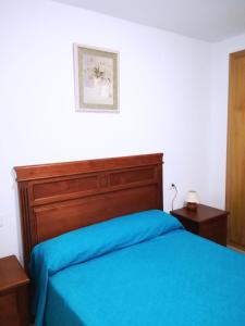 Llit o llits en una habitació de Villablanca Vidaber